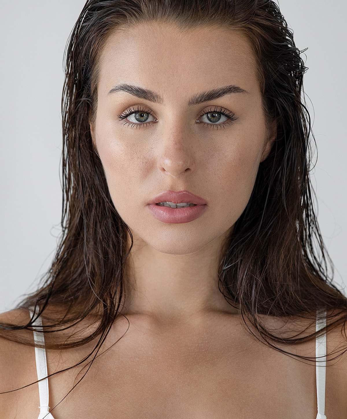 Sculptra model with wet hair.