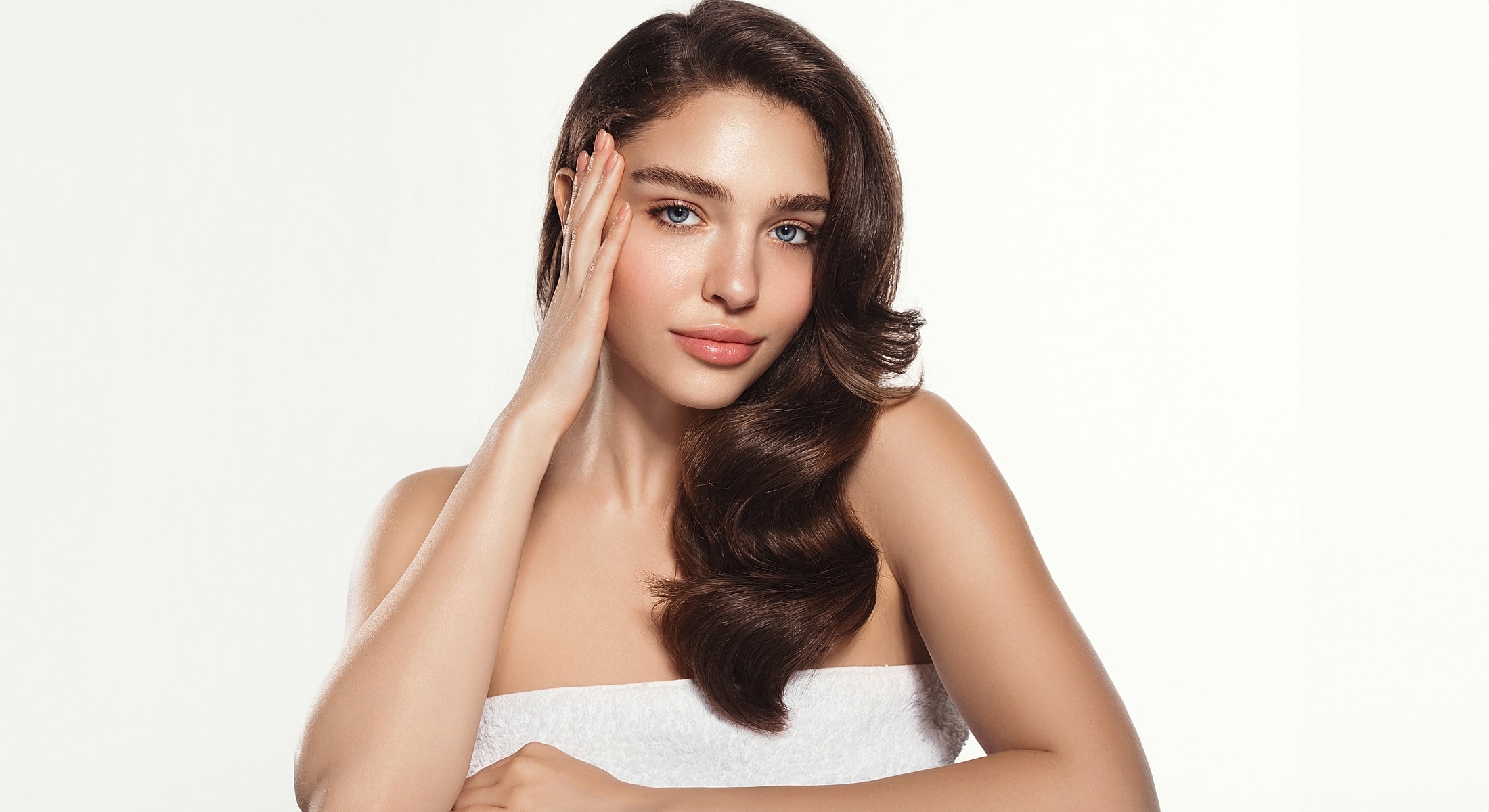 Rancho Santa Margarita Fine lines & wrinkles model with long hair posing gracefully.