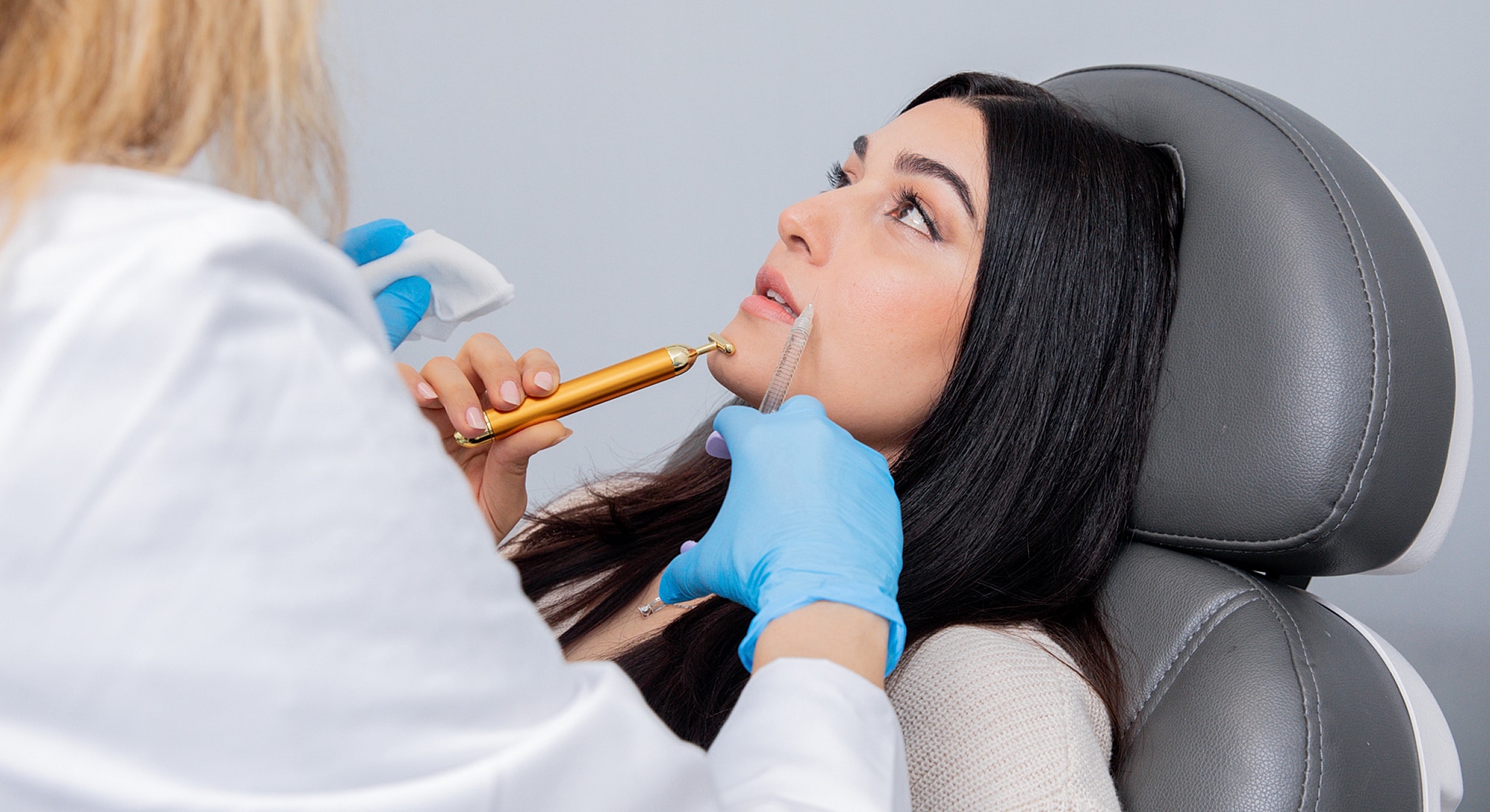 Patient receiving Juvederm Volbella XC treatment in clinic setting.